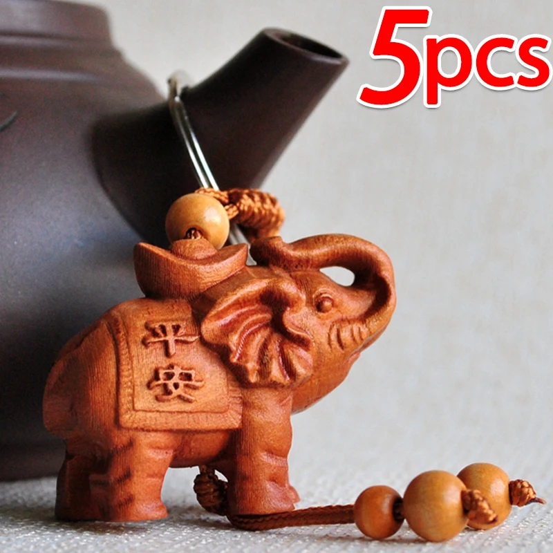 1-5ks Elephant Keachin Broskyňa broskyňa drevené bohatstvo bohatstvo Šťastný kľúče zvierat Prívesok Dámske vrecká Pom pom