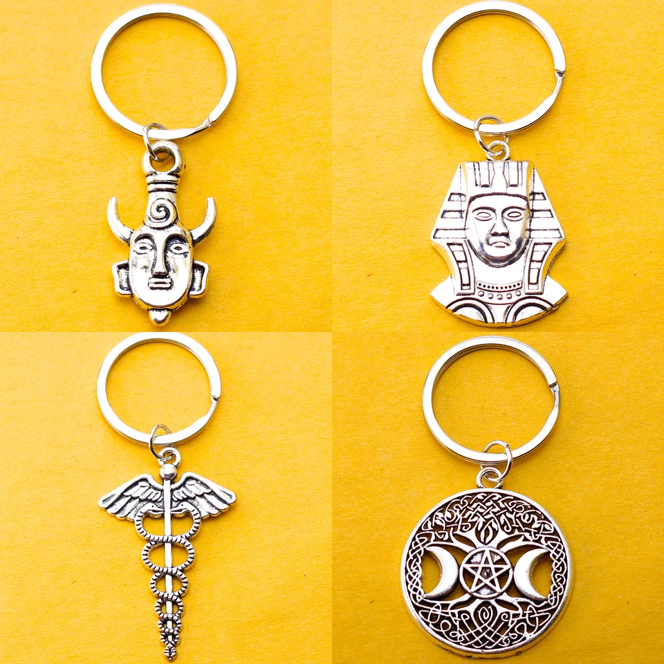 1 počítače Kľúčový reťazec Zinok Zinok náboženské viery dekorácie nevyhnutné pre festivaly múmia Buddha Peace Eye Dollar Pyramída