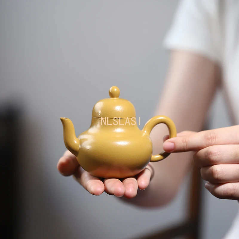 100 ml čínsky jixing fialová hlinená čajová kanvica malá kapacita kanvica Master Ručne vyrobený čajový hrniec Beauty Tea Infuser Surová ruda 1pcsteapot