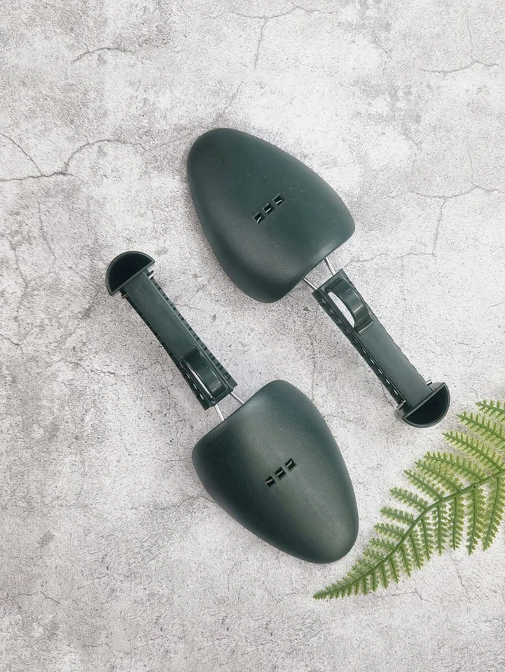 1pair unisex čierne nastaviteľné plastové topánky, kožené topánky PU, tvare športových topánok, nosidlá obuvi, obuv topánok.
