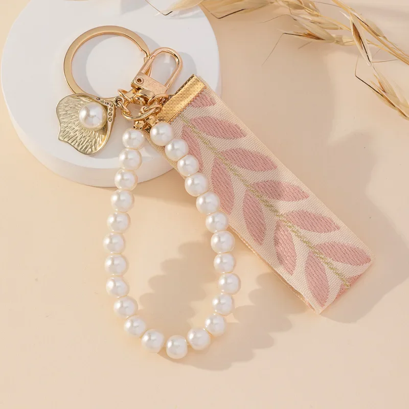 1pc faux perla korálkový náramok telefón, šnúrka, roztomilý list s kľúče keychain kabelka kúzlo na uši