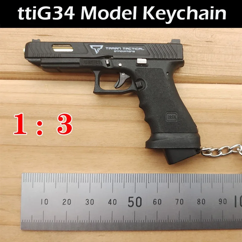 1PC Nová vysoko kvalitná zliatina Empire Mini Metal TTIG34 GLOCK G17 Kľúčenka bezplatná zostava proti stresu Fidget Model Hračky