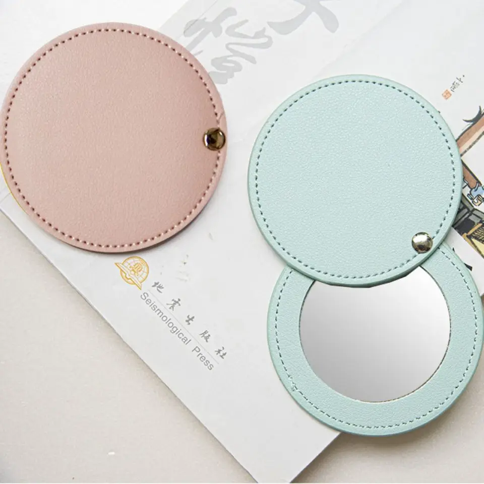 1PC Nový kožný make-up zrkadlo Round Round Round Ultra-THIN ľahké kozmetické zrkadlo mini masívne farby Prenosné cestovné vreckové zrkadlo