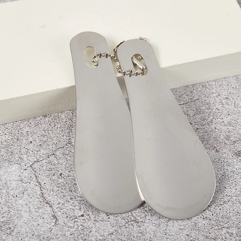 1PC Spoon Shoehorn Professional Shoehorn 10cm z nehrdzavejúcej ocele kovové topánky Rohové topánky Zdvíhacie náradie