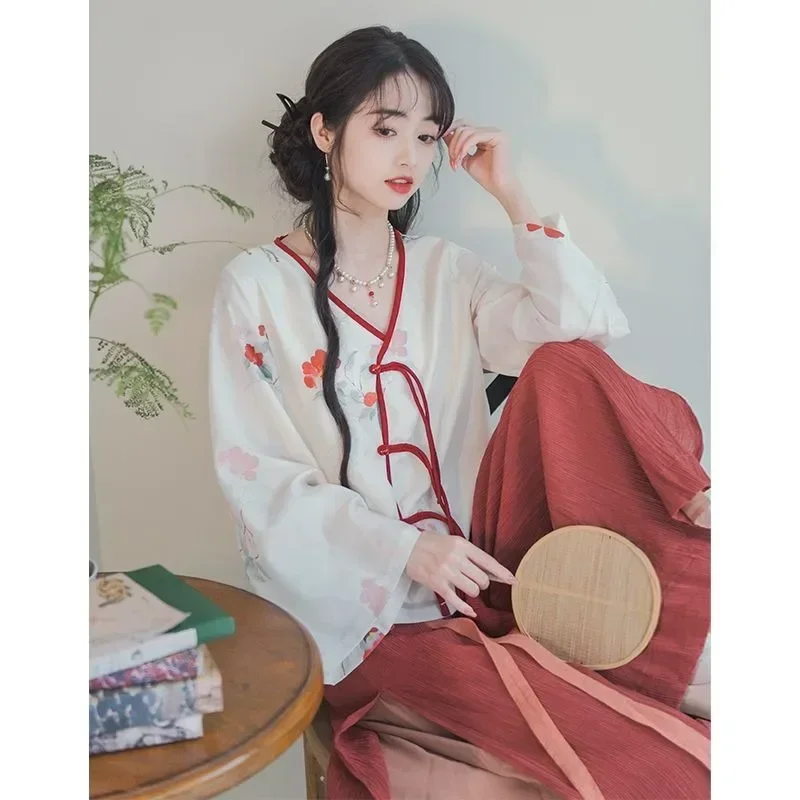 2023 Čínsky tradičný moderný moderný hanfu pre ženy Summer biela Camellia s dlhým rukávom Top hnedá červená červená šírka nohavice 2ks