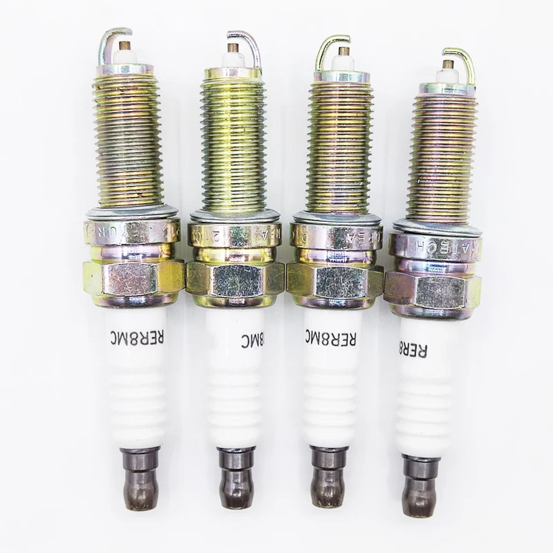 4pcs 18854-10080 RE8MC Nová zapaľovacia sviečka pre Hyundai i20 ix20 i30 Kia Cee'd Rio iii Venga Soul Carens Pro 1885410080