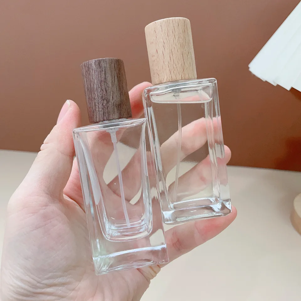 50 ml dreveného krytu parfumy prenosná sklenená sprejová fľaša s veľkou kapacitou Pretlač