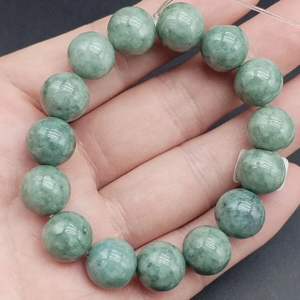 Certifikovaný olejový zelený prírodný typ A Jadeite vyrezávaný 12,5 mm guľôčkový pružný náramok