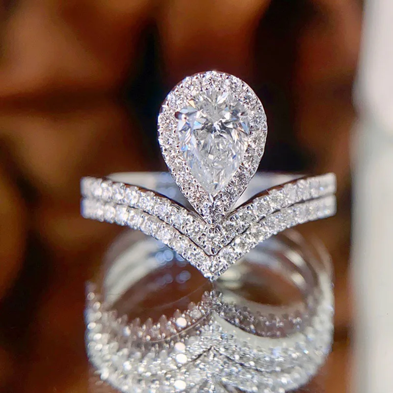 CXSjeremy 0,8ct Hruška Cut 7*5 mm moissanitský zásnubný prsteň sada 14k biele zlato V tvar stohovanie Zakrivený svadobný pás Darček pre ženy