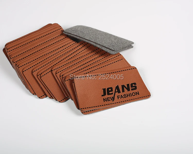 džínsy štítok Pu Leather Label Obliekanie hlavný štítok 50 ks veľa veľa