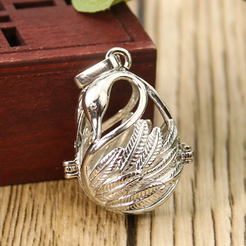 Elegantná harmónia chime guľa Swan prívesok Mexický Bola Locket Cage Náhrdelník Tehotenstvo Zvuky Zvon