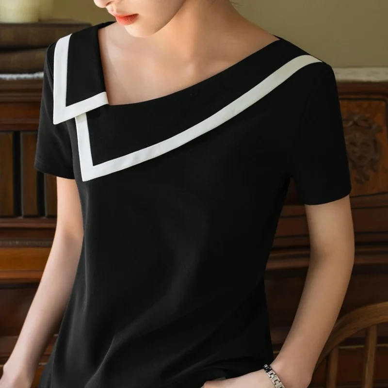 Francúzsky haute couture dizajn dizajn čiernej bielej obloženej diagonálne krk s krátkym rukávom Dámske patchwork móda tenký top