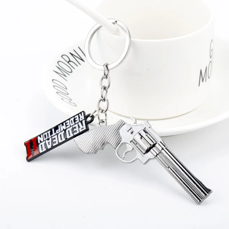 Game Red Dead Redemption Keychain RDR2 Logo Gun Logo Kľúčový reťazec pre ženy Men Keyring Jewelry GiftC