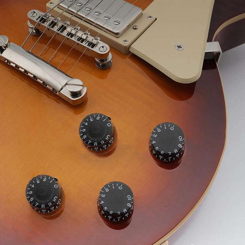 Guitarový doplnok so štyrmi balíčkami Elektrická gitarová basová hlasitosť Knob Potentiometer Hat LP tónový gombík