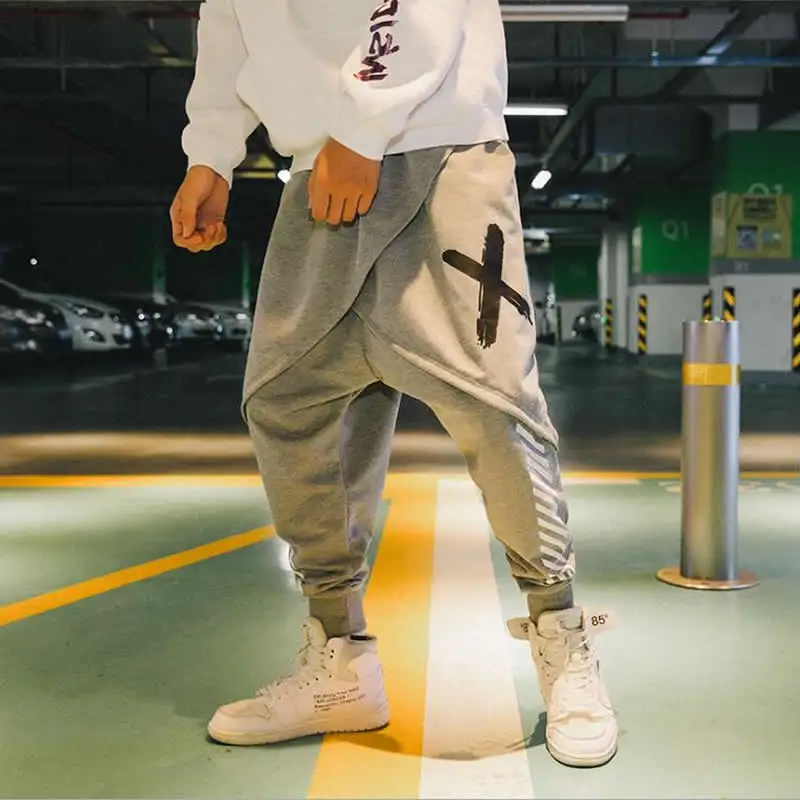 Harem Pants Men Pánske streetwear Casual Roggers Pants Mužské módy hip hopové stopy nohavice piesne