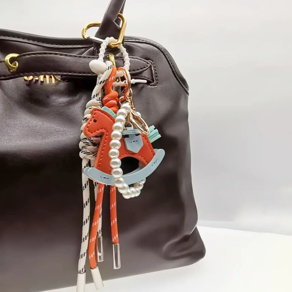 ITA BAG ACTIONAL TAGLE Kúzla perly PEARL NEPREKLACIE PRÍRUČKA PRE HERMES BAG Ženy Ženy kabelka kabelka Keychain muž batohový batoh reťaz