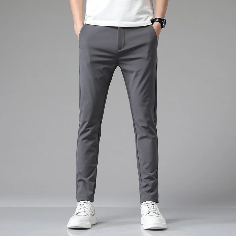Jeseň stredná váha natiahnite Slim Fit Fit Elastic Pase Pánske ležérne nohavice Jogger Kórejské klasické modré čierne šedé nohavice Muž