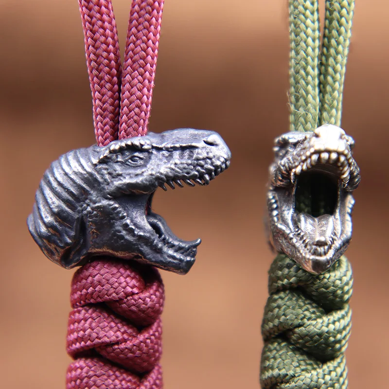 Jurassic tyrannosaurus rex hlava mosadz nôž korálky Dinosauur edd outdoor DIY paracord tkané šnúrka Keychain Prívesky