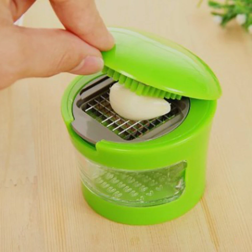 Kreatívna zeleninová rezačka ABS z nehrdzavejúcej ocele Cesnak Crusher Peeler Shaľujúci nekrytý kryt pre domácu kuchyňu
