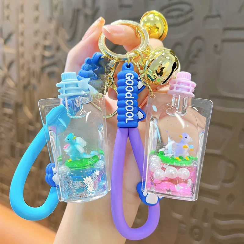 Kreatívny nový olej do dinosaur želé želé fľaše Kľúčový reťazec Chleba Lovely Liquid Quicksand Hanging Claw stroj darčeky
