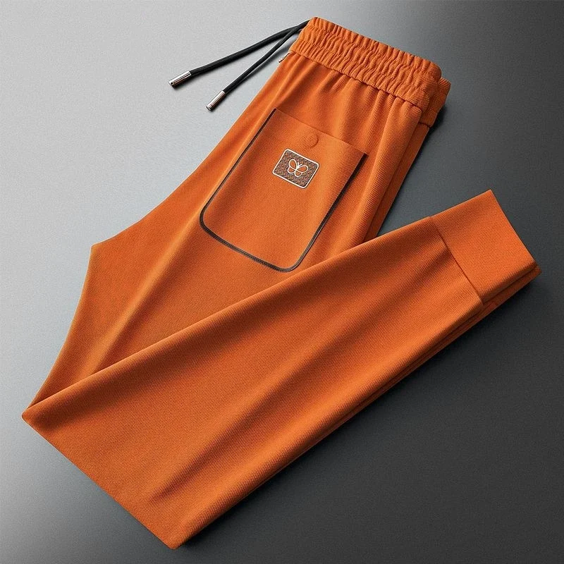 Luxusná značka Pánske dlhé nohavice Butterfly Print 2024 Nové golfové nohavice Summer ľahké trendy neformálne fitness nohavice