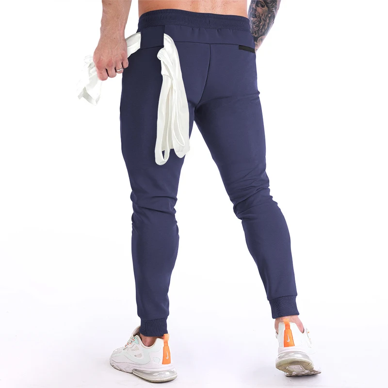Muži elastické joggingové tepláky rýchle suché športové bežecké nohavice Man Fitness Fitness CrossFit Training Pants Male telocvičňa oblečenie