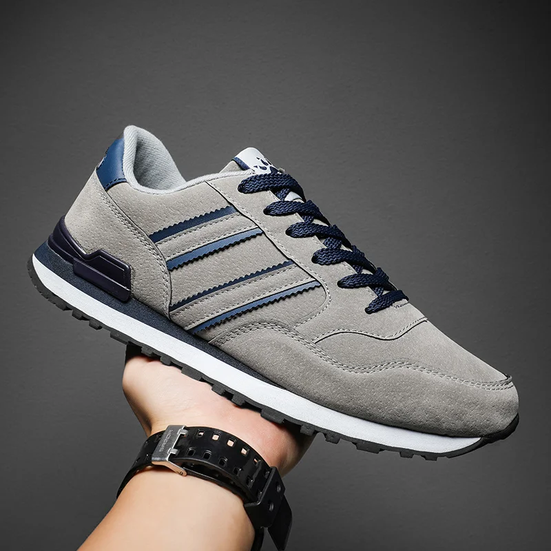 Muži priedušné tenisky Vysoko kvalitné bežecké jesenné kožené kožené ležérne ploché topánky 2024 Tenis plus Zapatillas hombre