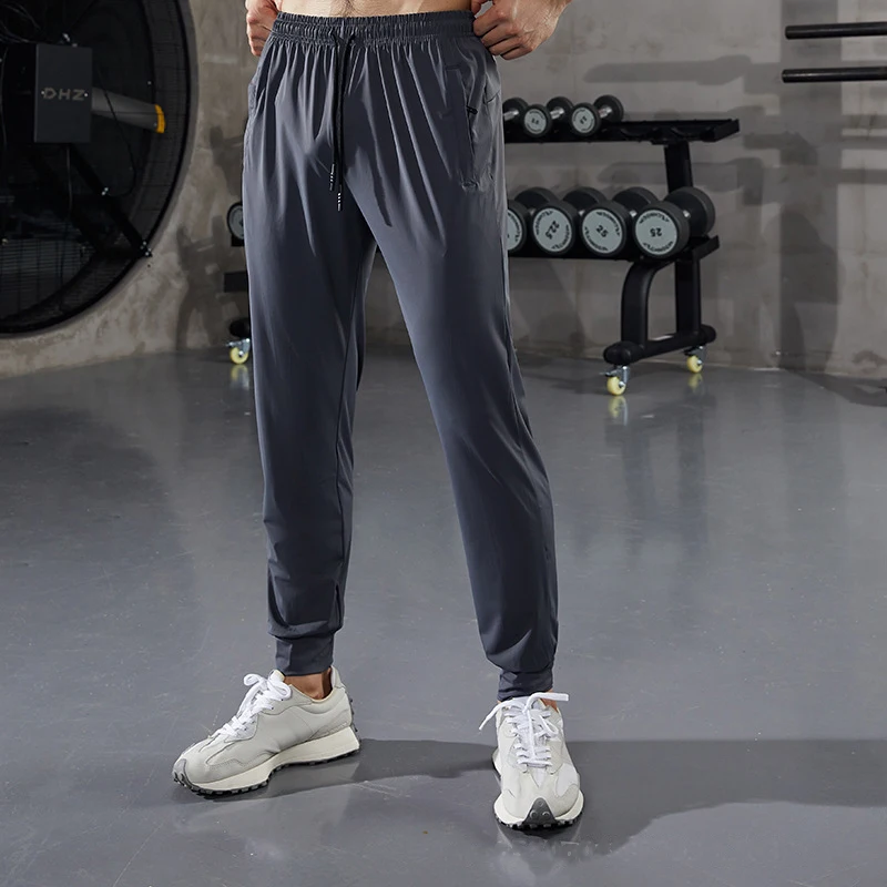 Muži tréningové nohavice Rýchle suché športové joggingové nohavice Kúpala Man Gymgger Pants Track nohavice bežiace nohavice mužské telocvične oblečenie