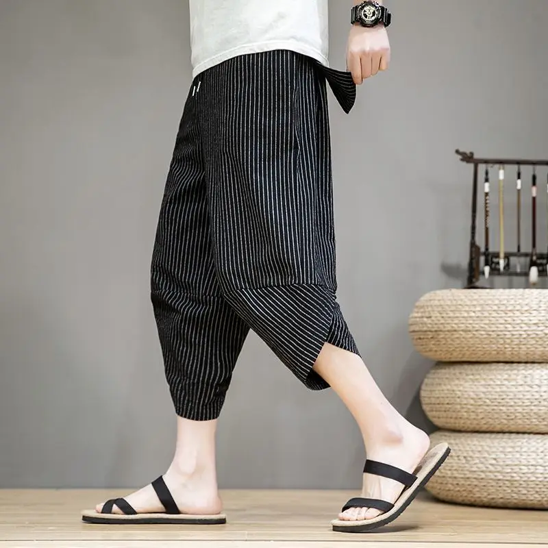 Móda leto nová elastická čakala neformálny trend tenké harlanské nohavice pánske pruhované pruhované patchwork vrecká jednoduché priame nohavice