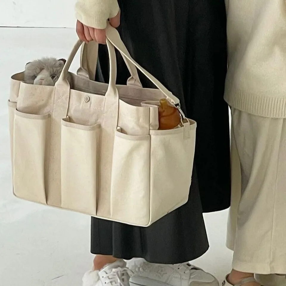 Niche Design Mommy Bag New Multi Compartment Veľká kapacita matka matka detská taška prenosná prenosná pre vonkajšiu prepravu mamičky
