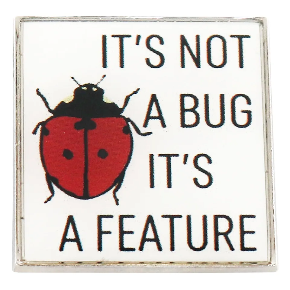Nie je to chyba, je to funkcia odznak Coder Engineer Software broš