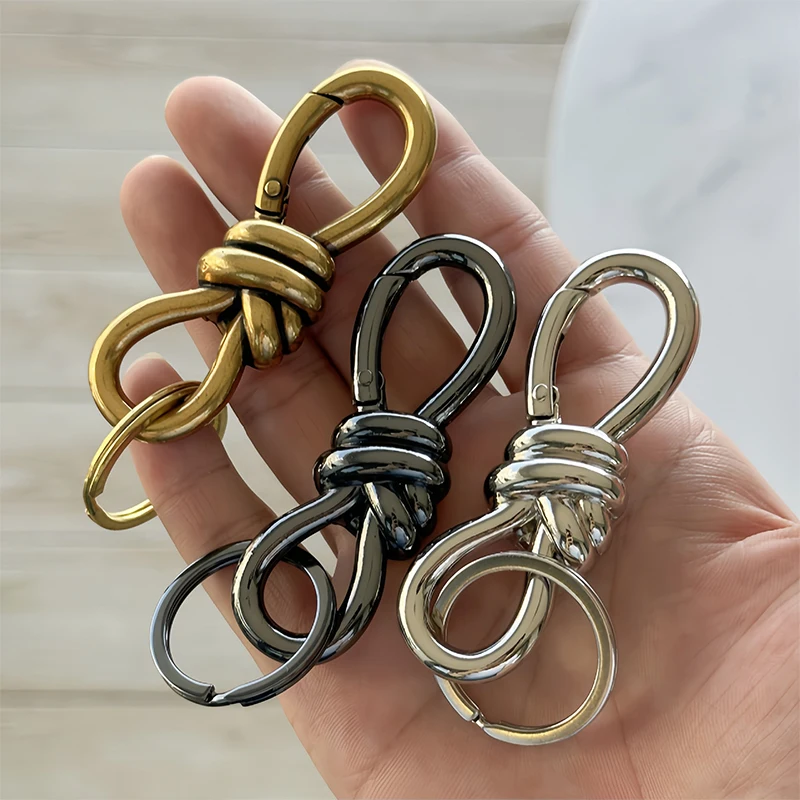 Nový keychain unisex pár prsteň Krúžk uzol Buunka Butterfly Buunka 8-tvaru Buckle Originálny dizajn Klávesové kľúče Prívesné príslušenstvo