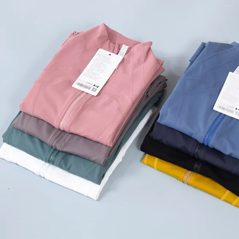 Nový plášť definuje ženské športové bunda tesne priliehajúce tenké športové oblečenie Coat Training Beh Running Gym Yoga Solid Color Cardigan Batchets