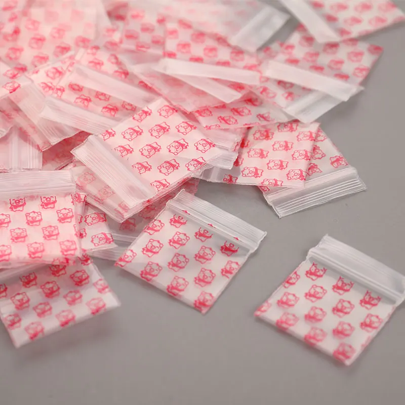 Nový príchod 100ks 22 mm*33 mm mini zipsové vrecká na zips s taškou na zips Plastové obaly vrecká na zips Pill Balenie vrecká