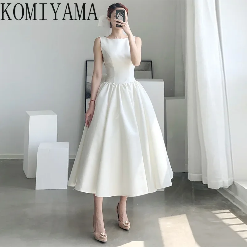 Prispôsobené elegantné jednoduché V-back Deisgn Svadobná strana Vestidos temperament Solid Slim Ples Prom šaty bez rukávov.