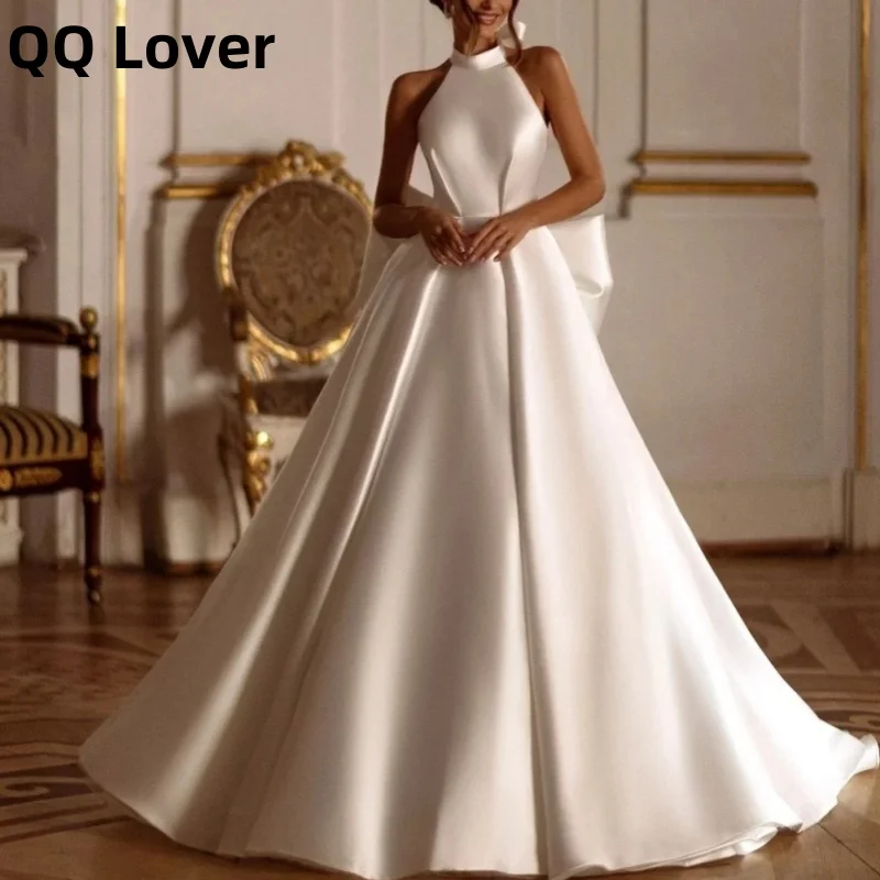 Sexy halter backless svadobné šaty klasické luk nevestu župan elegantný sklamaný satén A-line dlhé svadobné šaty 2025 Prispôsobené