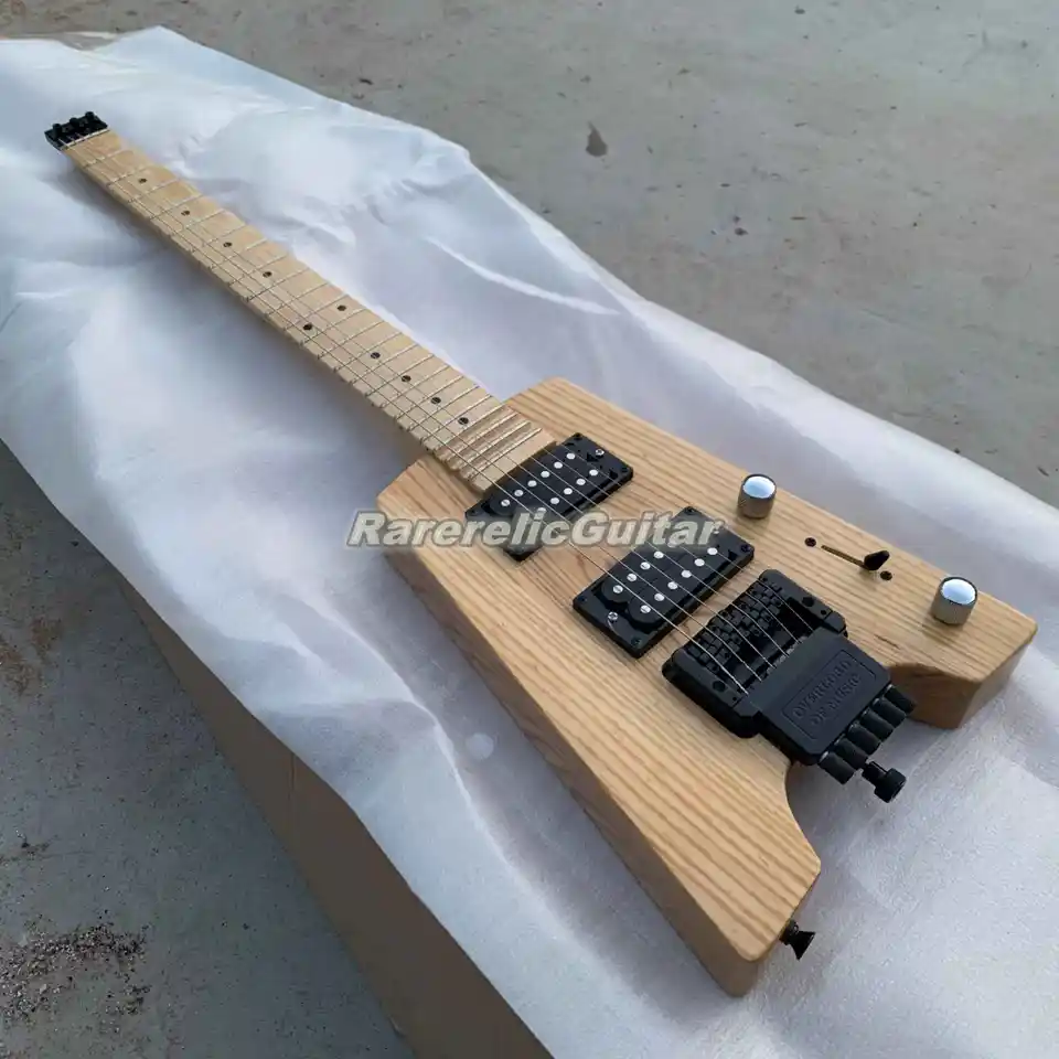 V zásobách viac farieb bezhlavá elektrická gitara Čína EMG snímače EMG tremolo most javorový krk ružový hmatník hmatníka čierny hardvér