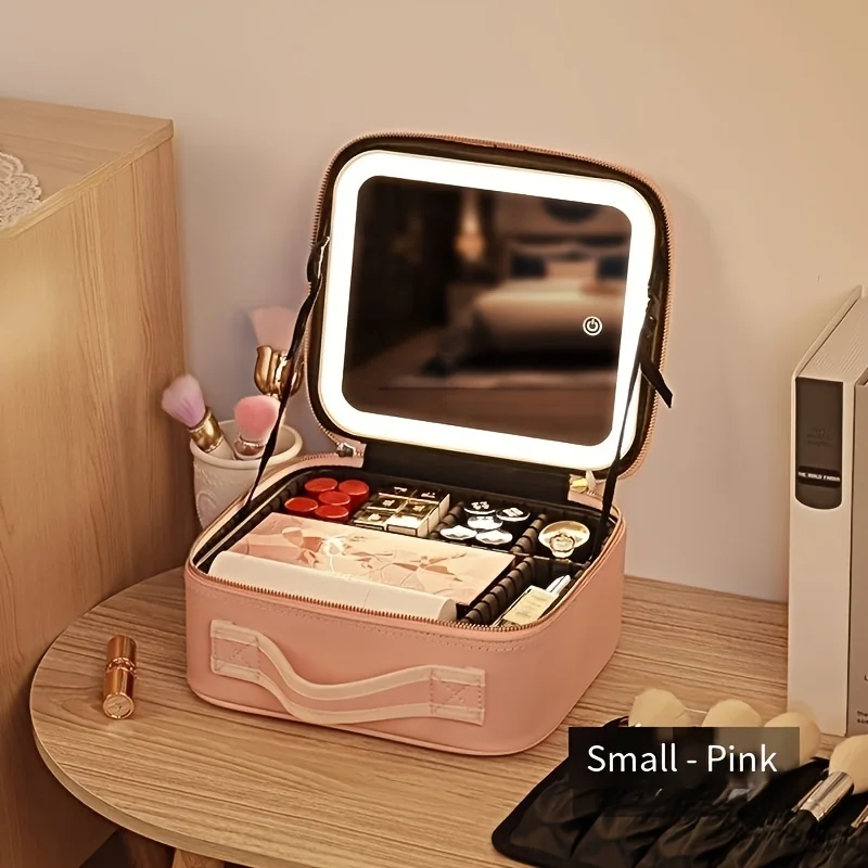 Veľká kapacita so svetlom a zrkadlom, odnímateľnou priečkou, úložným taškou na make -up, prenosným cestovným taškou