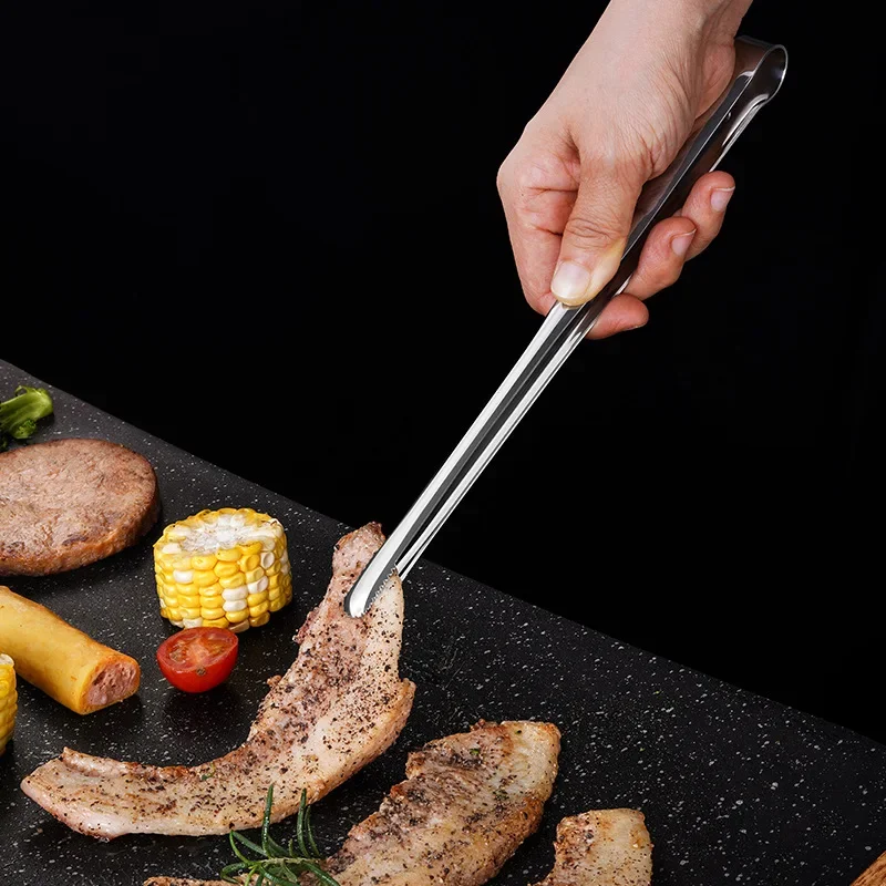 Zúbkované grilové kliešte z nehrdzavejúcej ocele Clip BBQ Steak Clip Bread Tong Coens Party Party nekĺzané kuchynské pomôcky Príslušenstvo